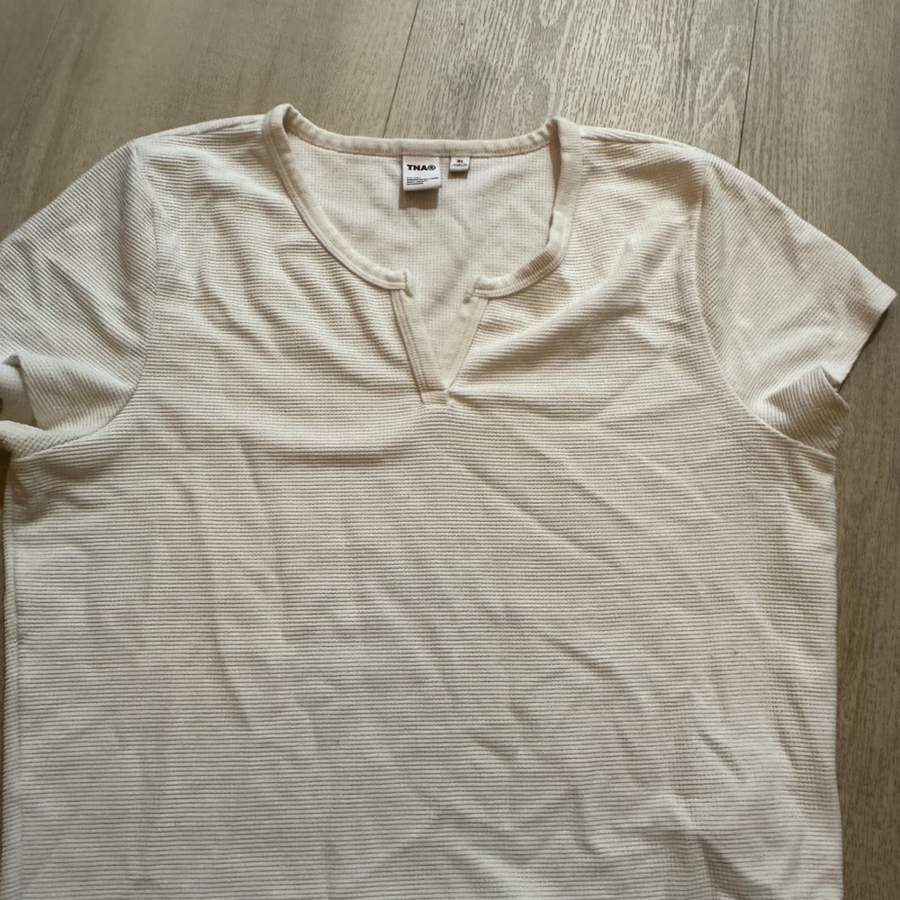 Aritzia TNA Cream Textured Short Sleeve Notch-Neck Tee